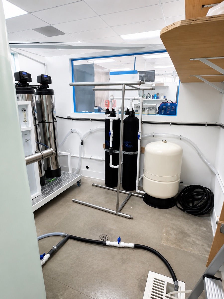 Filtration room at Clean River Water Store in Santa Clarita with reverse osmosis tanks and equipment